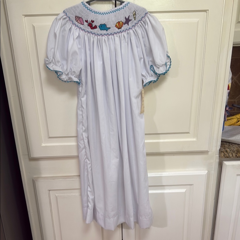 Adorable White Kids Dress with Embroidered Accents